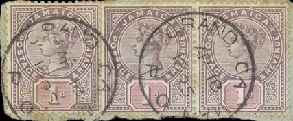 Piece showing Jamaican stamps cancelled by the Grand Cayman postmark dated 18th April 1895.
